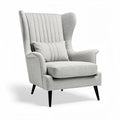 Fauteuil en tissu gris clair avec accoudoirs et dimensions 90 x 80 x 100 cm